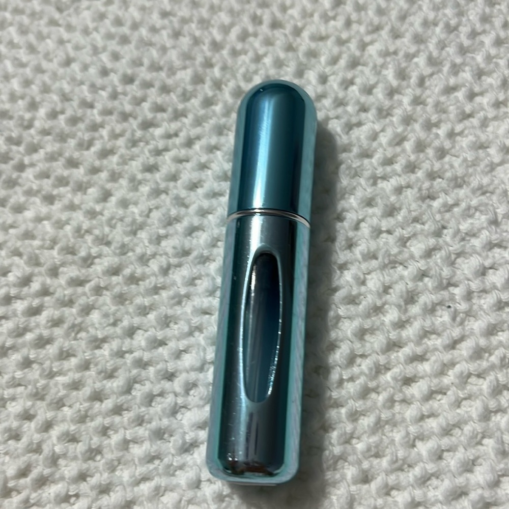 Refillable  perfume atomizers